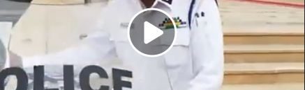 ضابط يقود دراجة بخارية