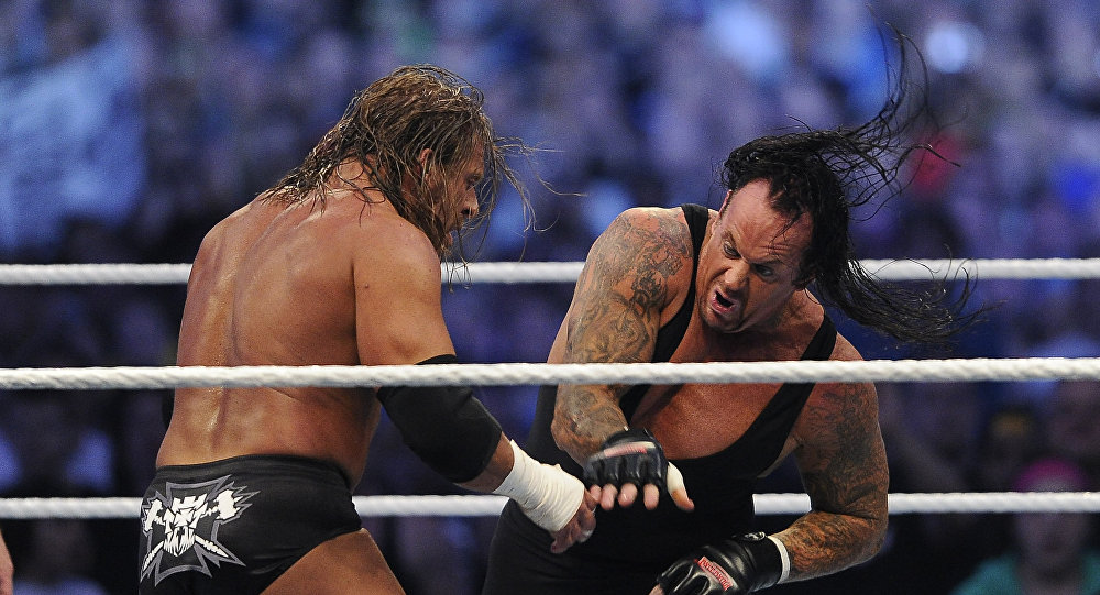 بالفيديو.. ترامب يخرج إلى المسرح للقاء مؤيديه على أنغام موسيقى المصارع "أندرتيكر" 1 اندرتيكر وتربيك اتش