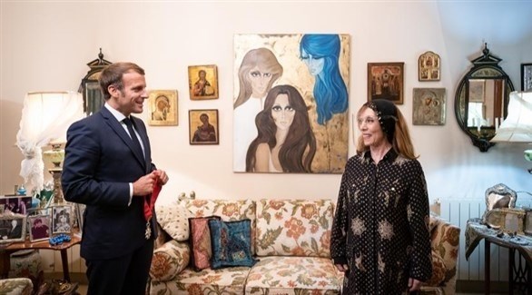 شاهد بالصورة.. ما هي حقيقة لقاء الفنانة السودانية الضجة عشة الجبل بالرئيس الفرنسي ماكرون؟ 2 فيروز وماكرون